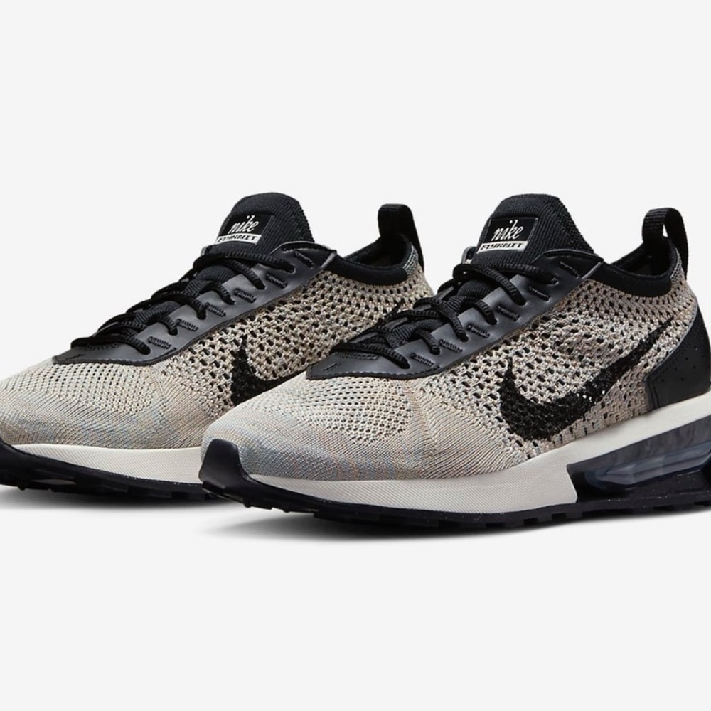 Women’s Nike Air Max Flyknit Racer sneakers in a black/white/sesame colorway